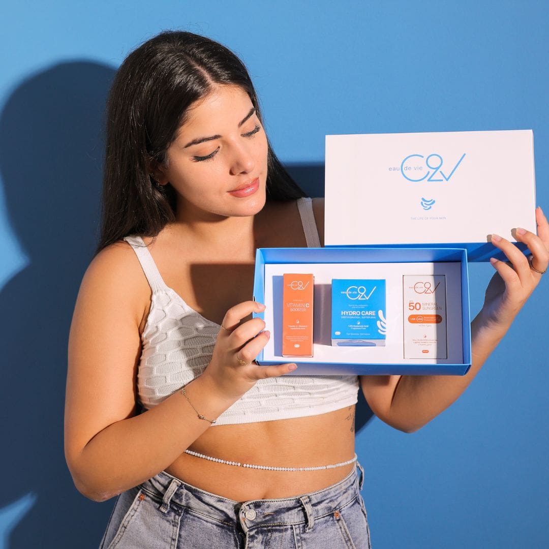 Woman holding a skincare set gift